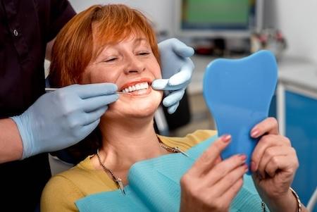 Woman getting fitted for dental implant, scottsdale az