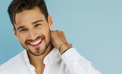 Man smiling after dental bonding, scottsdale az