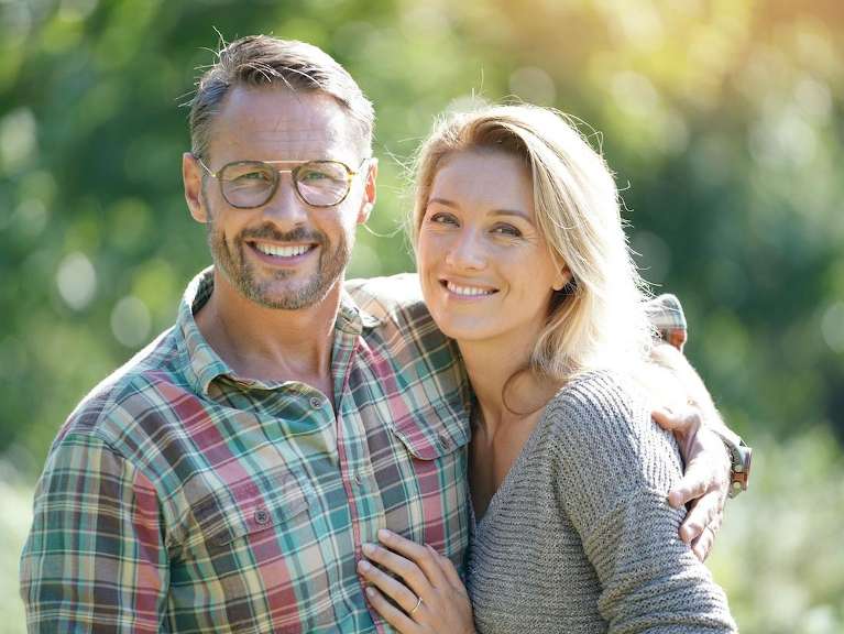 happy couple with veneers in scottsdale