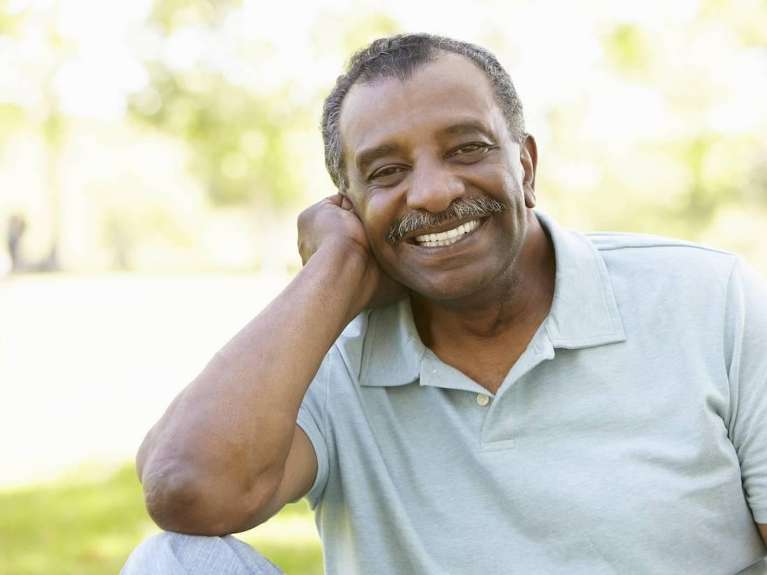 older man smiling in a park in scottsdale
