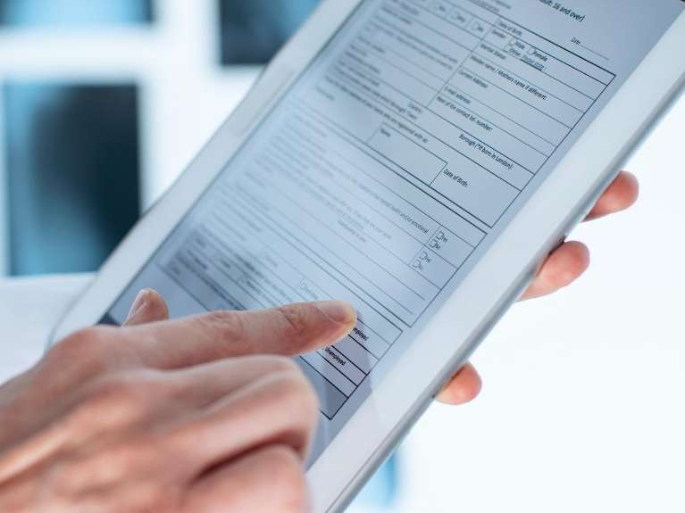 A tablet displaying digital records of a patient, scottsdale az