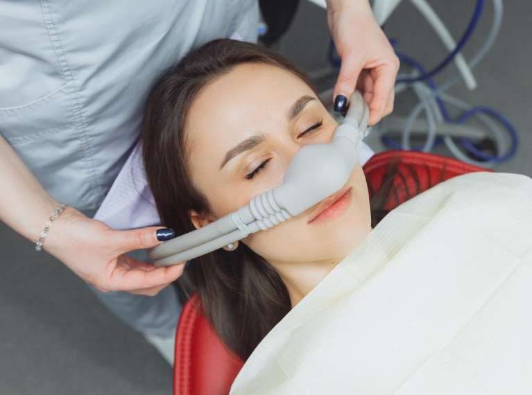 Nitrous oxide being used on woman, scottsdale az